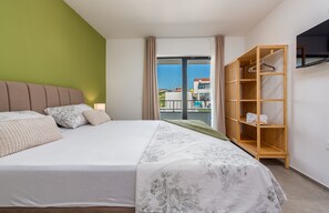 3 dormitorios, tabla de planchar con plancha, wifi gratis y ropa de cama