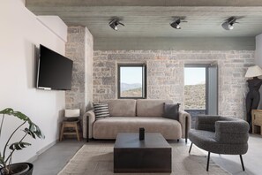 Villa exclusive, vue sur la mer | Aire de séjour | Téléviseur connecté de 50 po avec télévision numérique