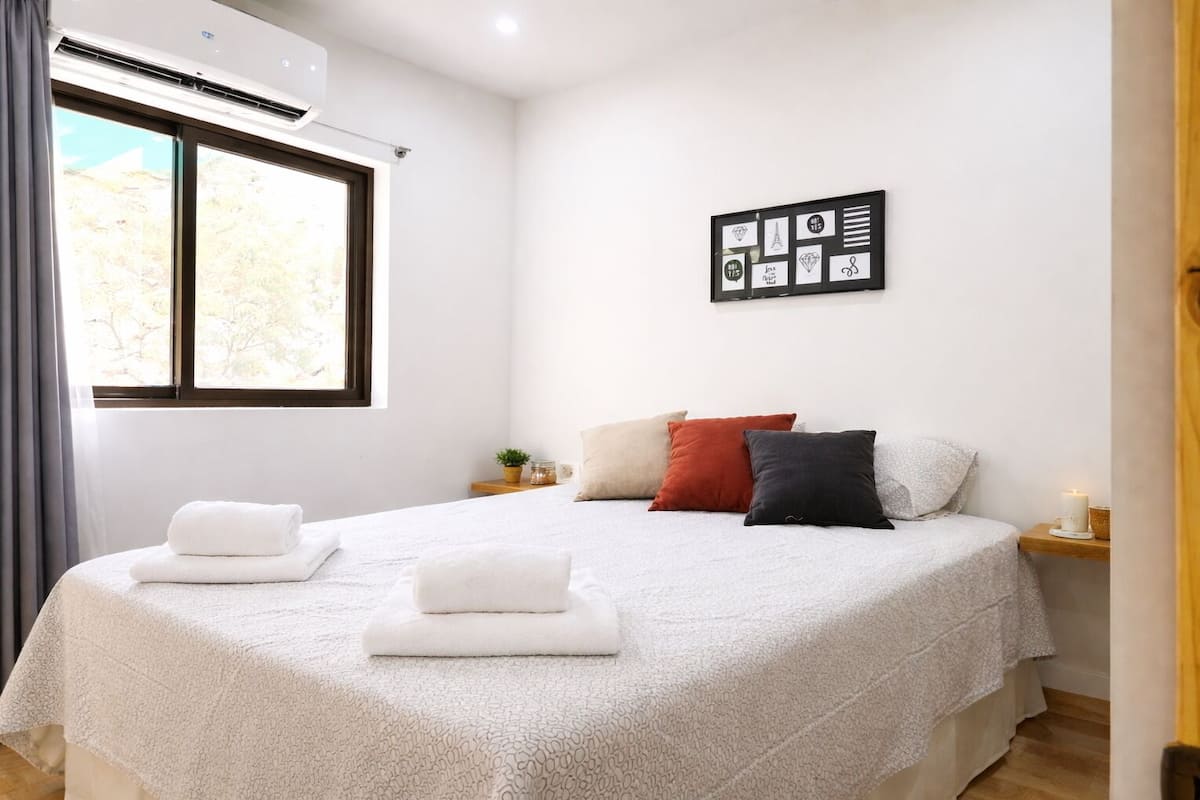 패밀리 아파트, 발코니, 정원 전망 | 2 개의 침실, 객실 내 금고, 무료 WiFi