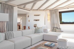 Signature Suite, 3 Bedrooms, Sea View, Executive Level | Living area | 50-inch Smart TV with digital channels, iPad, first-run movies - La Tiara di Cervo  (Arzachena)