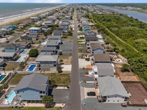 A coastal residential area with houses, a beach, and a pier. - Shell Haven-Four Decks, Views, Pet friendly, Walk to beach! (Holden Beach)