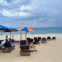 On the beach, white sand, free beach cabanas, sun-loungers