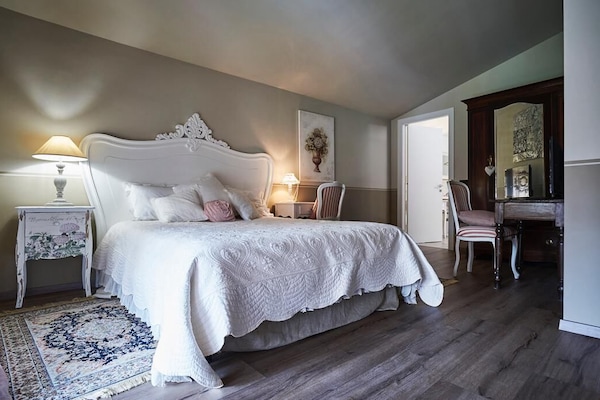 Deluxe tweepersoonskamer, uitzicht op tuin | Gratis wifi