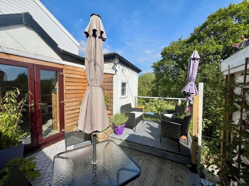 Overlooking the River Severn its path/cycle route with outside seating & dining.