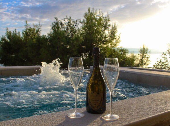 Apartment (Two Bedroom Apartment with Sea View a) | Pool | Seasonal outdoor pool, pool umbrellas, sun loungers