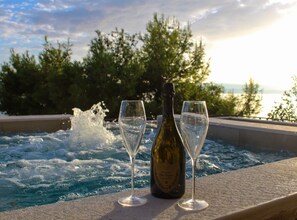 Apartment (Two Bedroom Apartment with Sea View a) | Pool | Seasonal outdoor pool, pool umbrellas, pool loungers