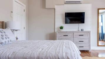 2 habitaciones, tabla de planchar con plancha, cuna de viaje y wifi