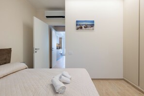 1 dormitorio, tabla de planchar con plancha, wifi gratis y ropa de cama