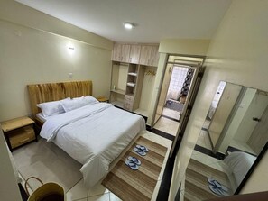 2 habitaciones, tabla de planchar con plancha y wifi