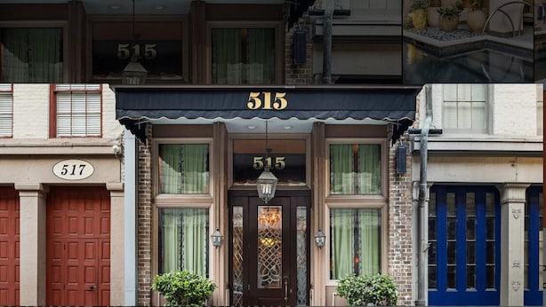 Un edificio con el número '515' visible sobre la entrada.