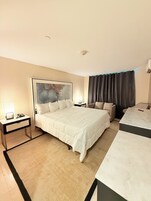Deluxe Room, 1 King Bed | Desk, laptop workspace, iron/ironing board, free WiFi