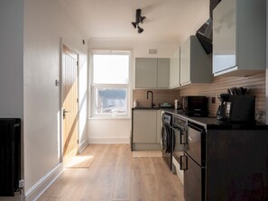 Fridge, microwave, oven, coffee/tea maker