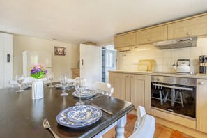 Fridge, oven, cookware/dishes/utensils