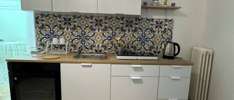 Microondas, horno y parrilla de estufa