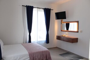 Family Double Room, Patio, City View | Desk, laptop workspace, free WiFi