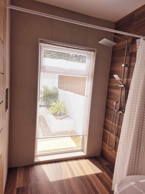 Shower, hair dryer, towels, soap