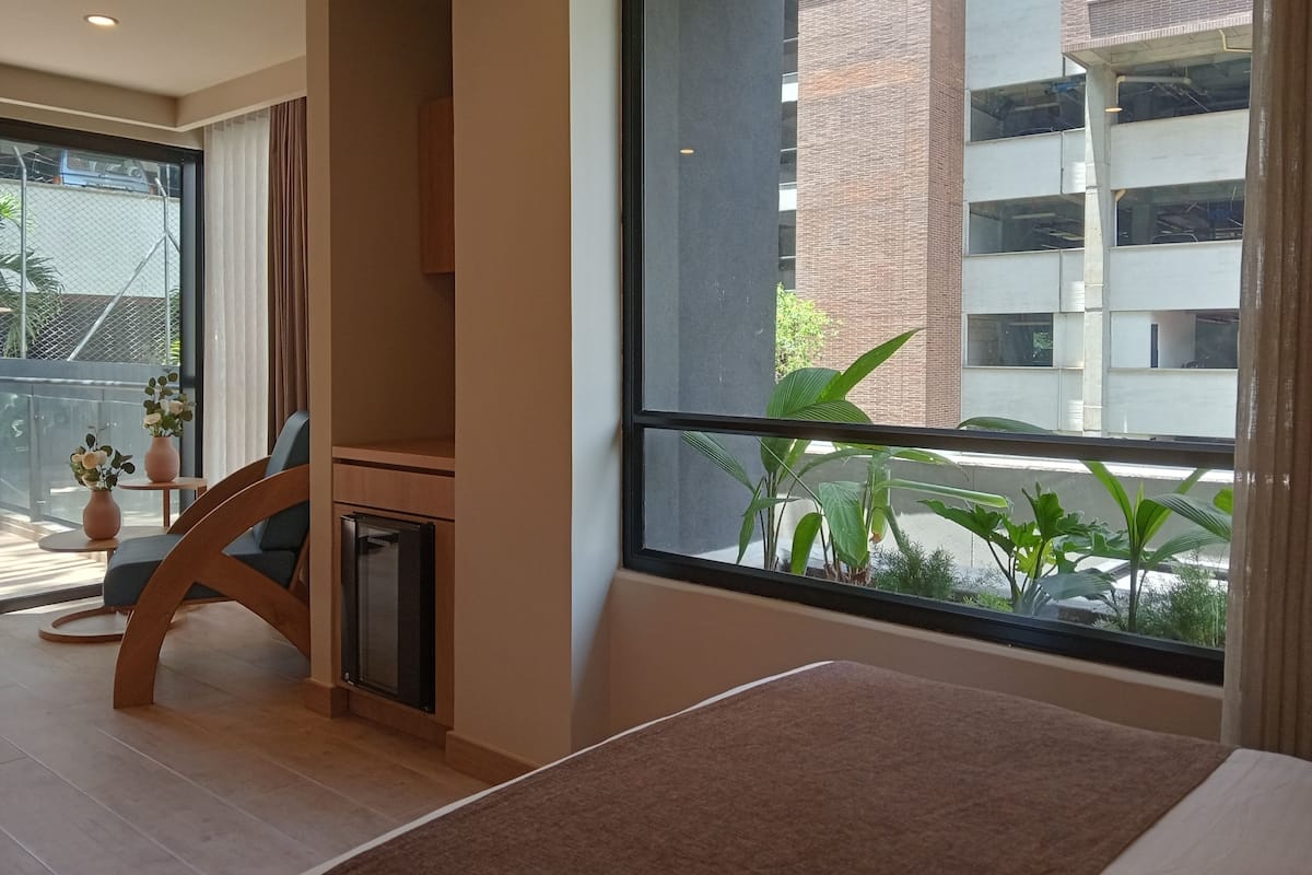 Premium bedding, down comforters, Select Comfort beds, minibar