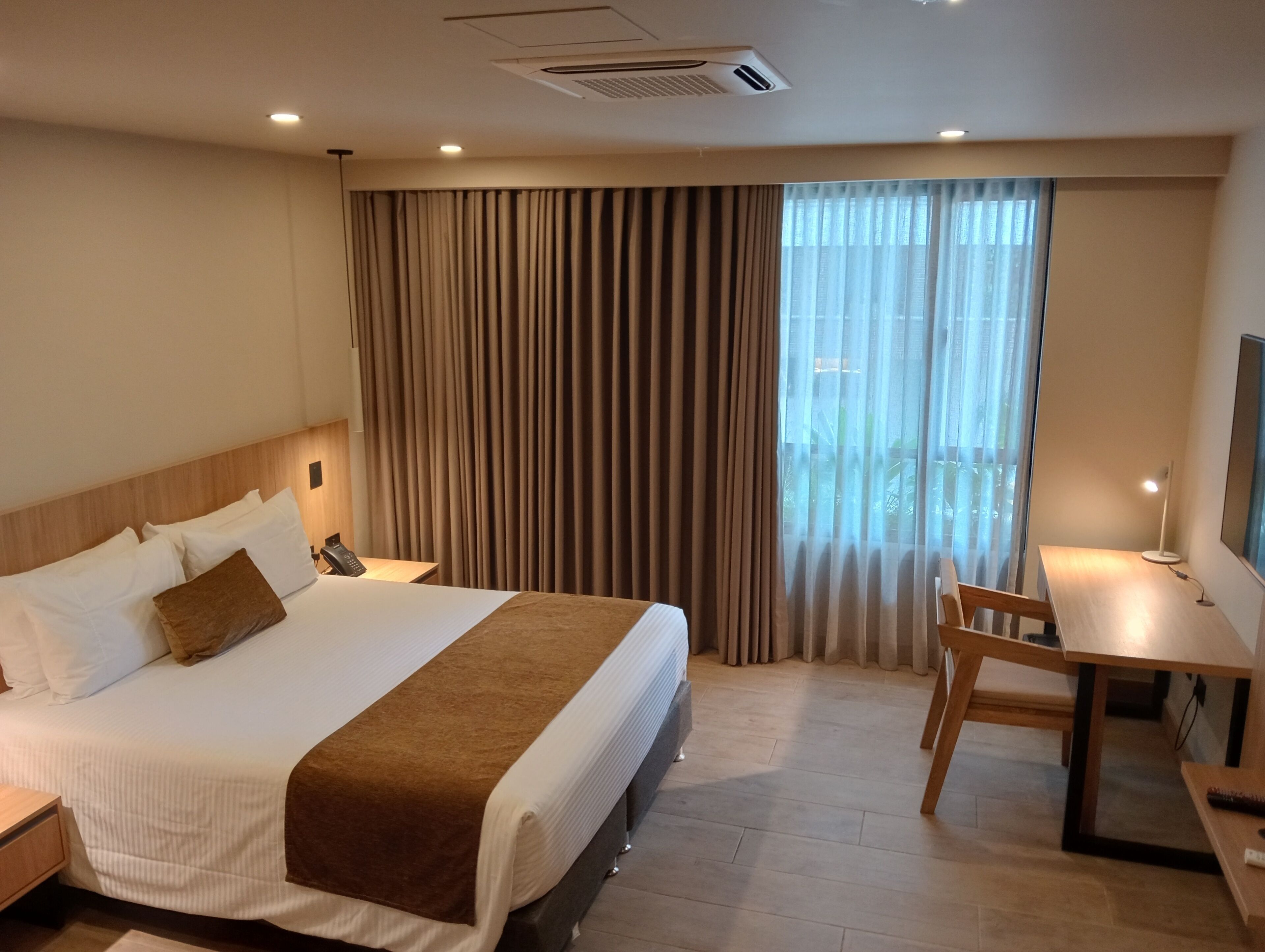 Luxe beddengoed, donsdekens, Select Comfort-bedden, een minibar