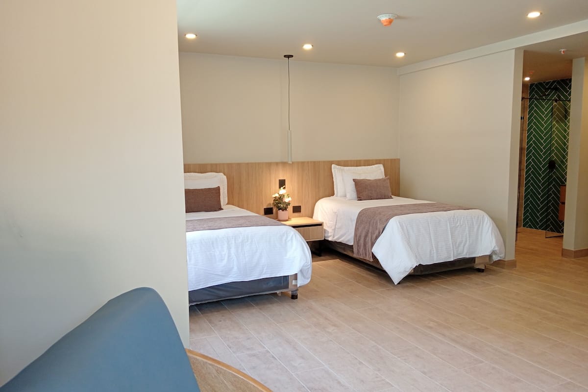 Premium bedding, down comforters, Select Comfort beds, minibar