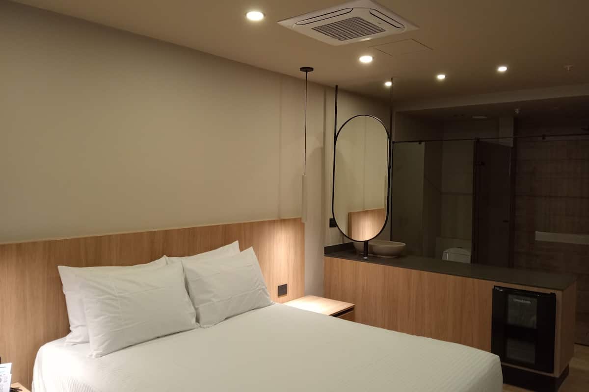 Premium bedding, down comforters, Select Comfort beds, minibar