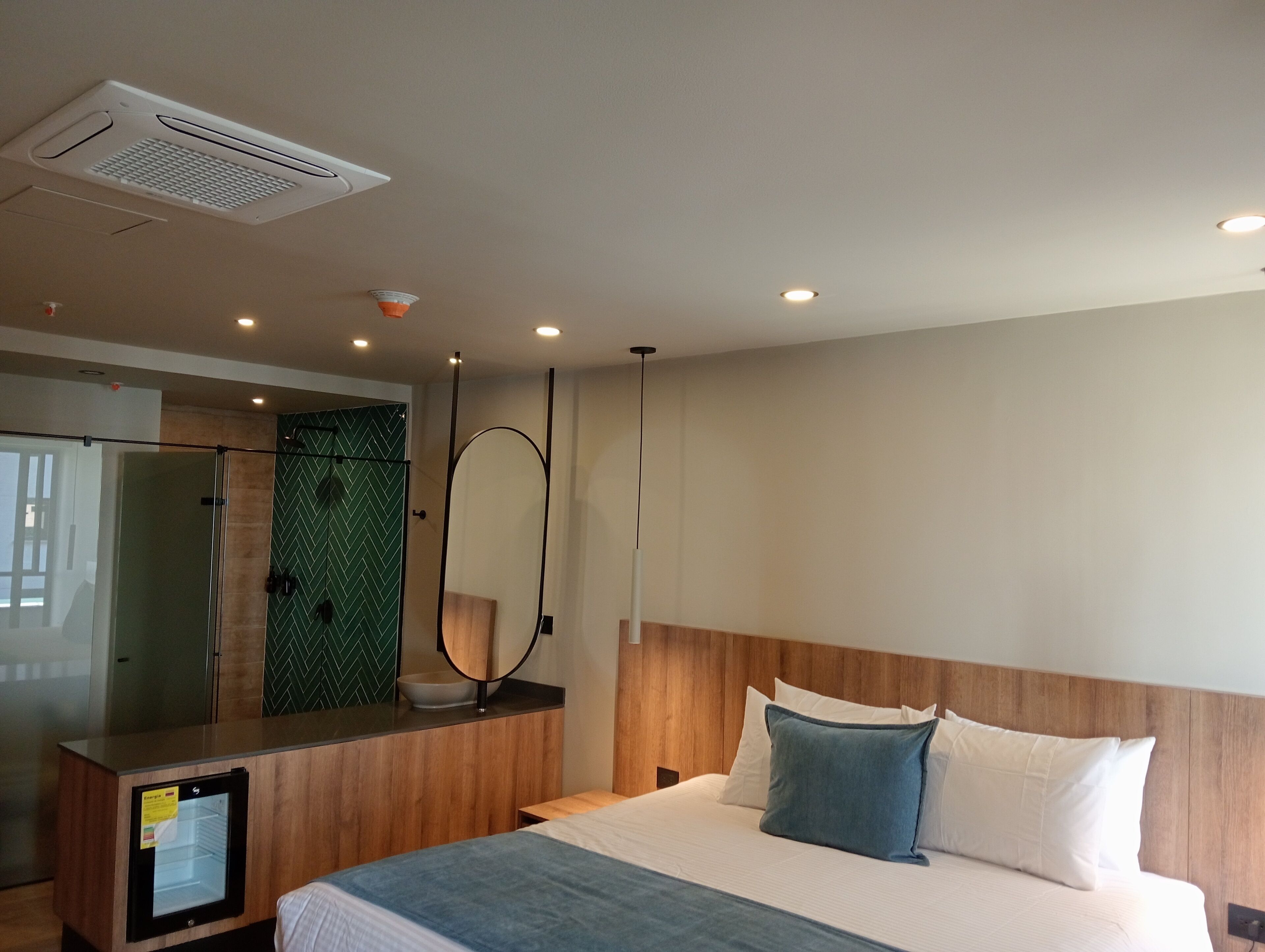 Luxe beddengoed, donsdekens, Select Comfort-bedden, een minibar