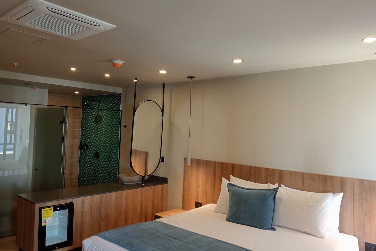 Premium bedding, down comforters, Select Comfort beds, minibar