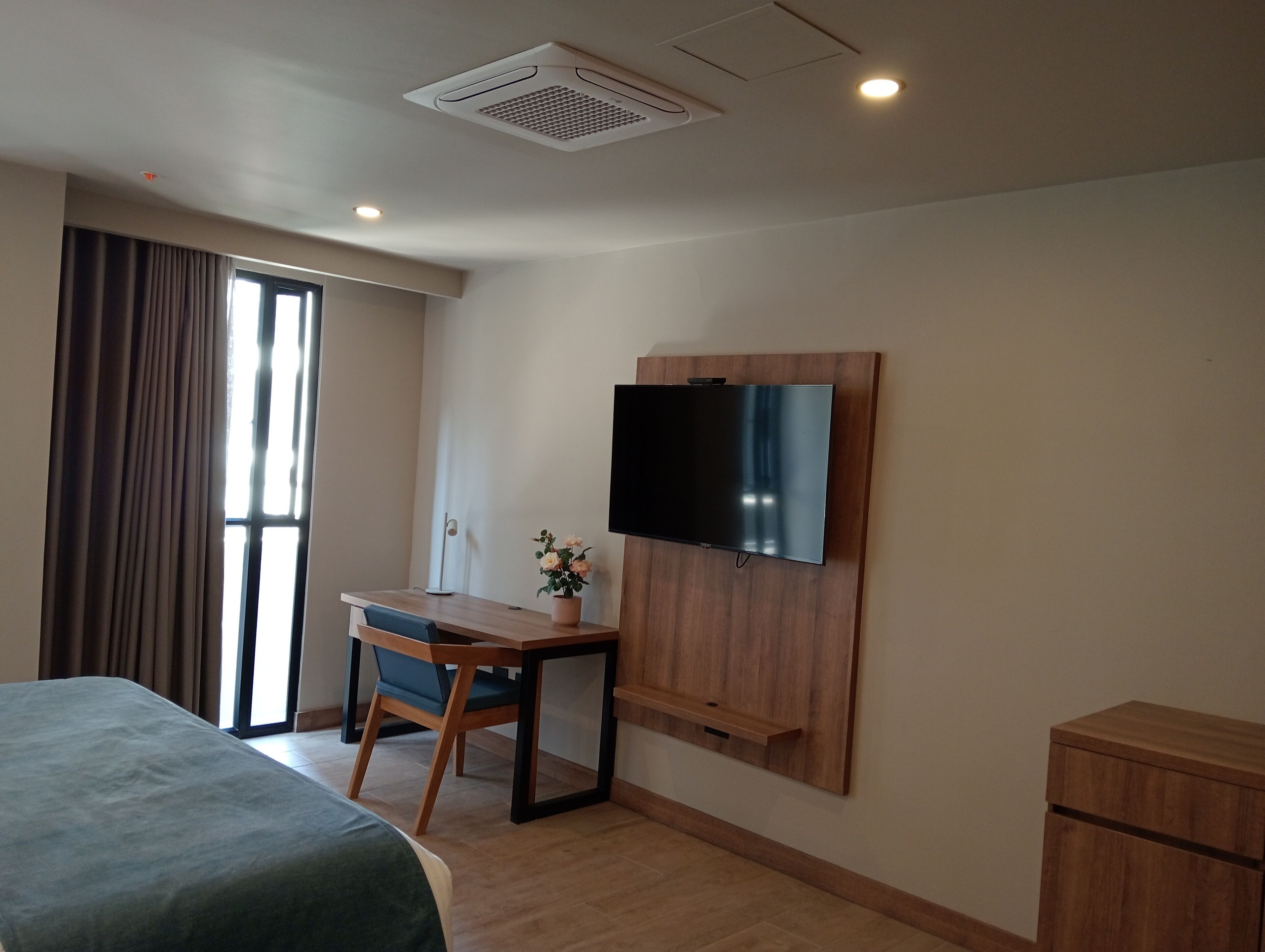 Luxe beddengoed, donsdekens, Select Comfort-bedden, een minibar