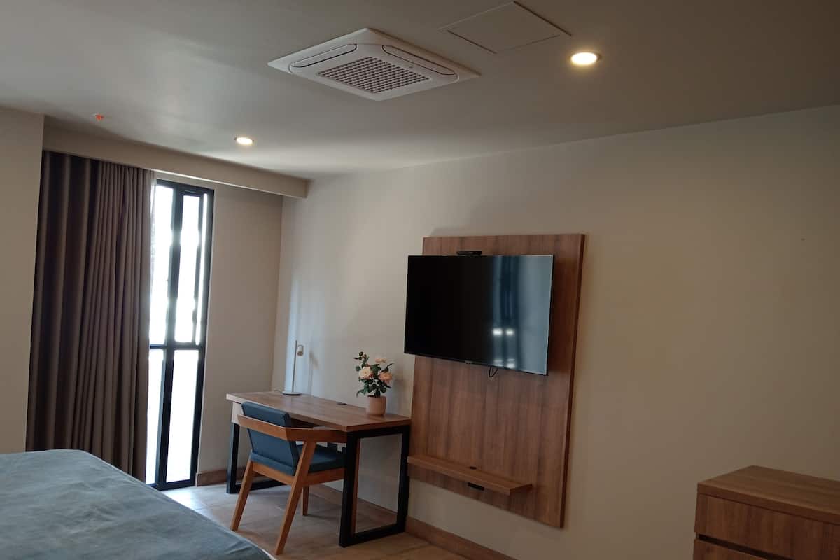 Premium bedding, down comforters, Select Comfort beds, minibar