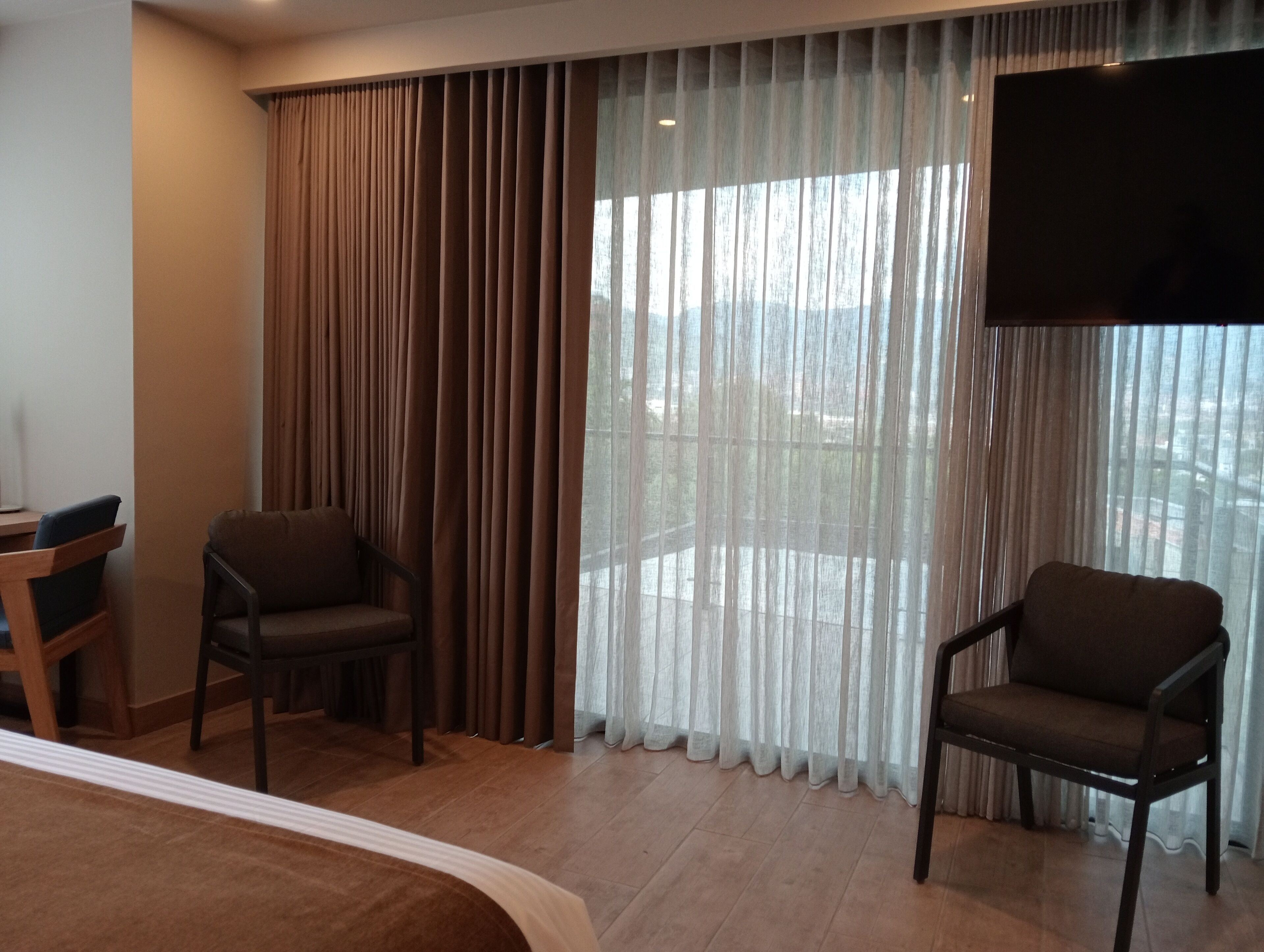 Luxe beddengoed, donsdekens, Select Comfort-bedden, een minibar