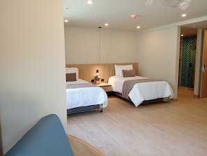 Premium bedding, down comforters, Select Comfort beds, minibar