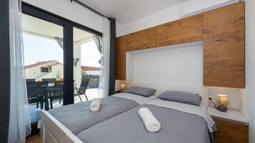 2 slaapkamers, een strijkplank/strijkijzer, gratis wifi