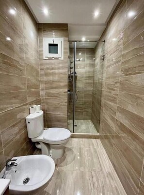 Hair dryer, towels, soap, toilet paper