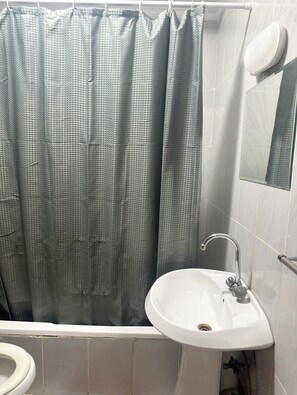 Hair dryer, towels, soap, toilet paper