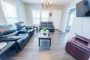 House | Living area | 55-inch Smart TV with digital channels