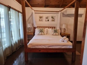 Standard Cabin, 1 Queen Bed, Air conditioning, Beachside | Free WiFi, bed sheets, wheelchair access - Las Palmas Cabins (Dixon Cove)