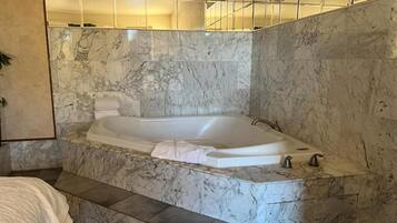 Bathroom | Separate tub and shower, towels, soap, shampoo