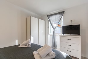 1 chambre, fer et planche à repasser, Wi-Fi, draps fournis