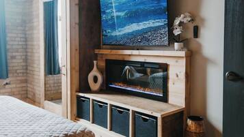 2 habitaciones, tabla de planchar con plancha y cuna de viaje