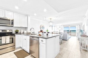 Fridge, microwave, oven, stovetop - Direct Oceanfront Escape– Steps to the Beach W/ Heated Pool, Private Balcony & Grills (Cocoa Beach)