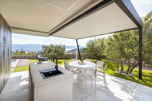 Outdoor dining - Villa Panoramica with heated pool and sauna (Kvarner - Vrbnik) (Vrbnik)