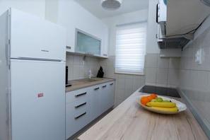 Apartment (Two bedroom Apartment with Balcony an) | Private kitchen | Fridge