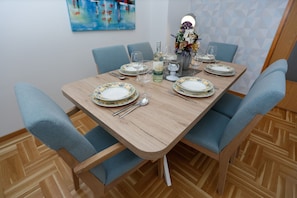 Apartment (Two bedroom Apartment with Balcony an) | Living room | 32-inch flat-screen TV with cable channels