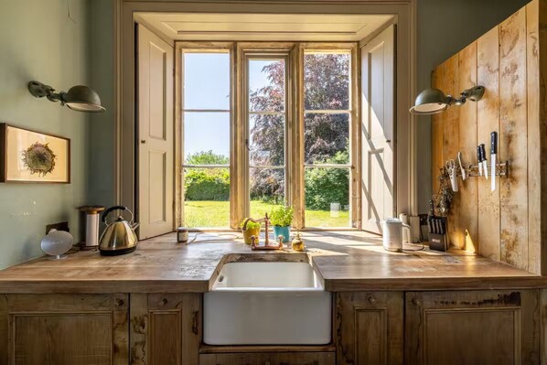 Comfort Room, Patio, Garden View | Bathroom | Combined shower/tub, hair dryer, towels, soap