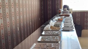 A buffet table with various food items and a plate of boiled eggs. - Luxury Wadi Rum Camp (Wadi Rum)