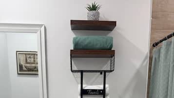 Hair dryer, towels, soap, toilet paper