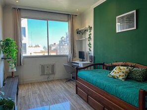 Basic Apartment | Desk, laptop workspace, blackout drapes, iron/ironing board