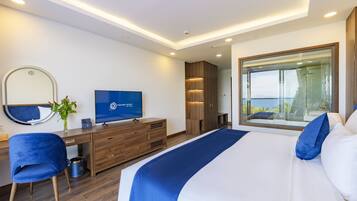 Premium bedding, memory-foam beds, minibar, in-room safe
