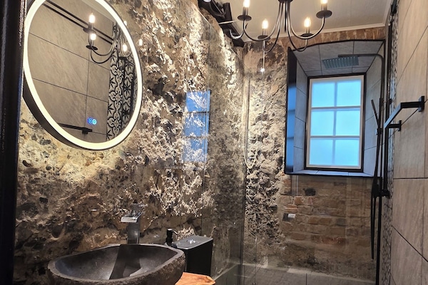 Deluxe Quadruple Room | Bathroom | Bathtub, hair dryer, towels, soap