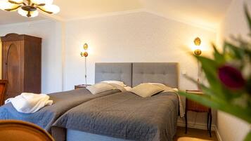 Deluxe dubbelrum | Arbetsyta för laptop, mörklÀggningsgardiner och ljudisolering