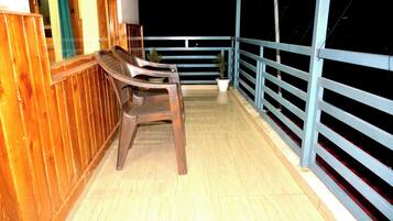 Deluxe Double Room, Hill View | Living area | TV